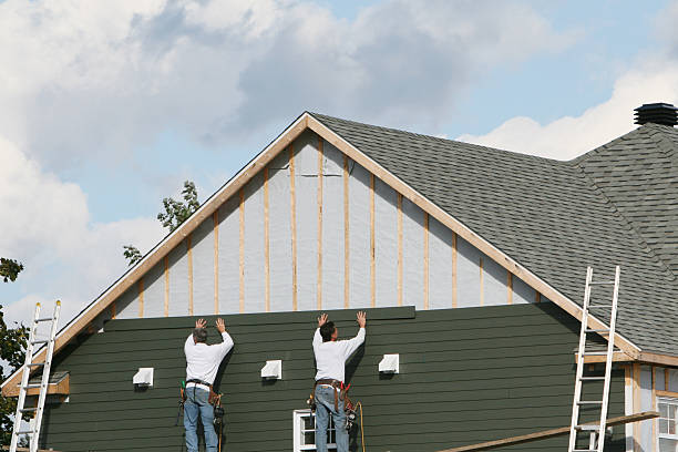 Professional Siding technician working in Cairnbrook, PA